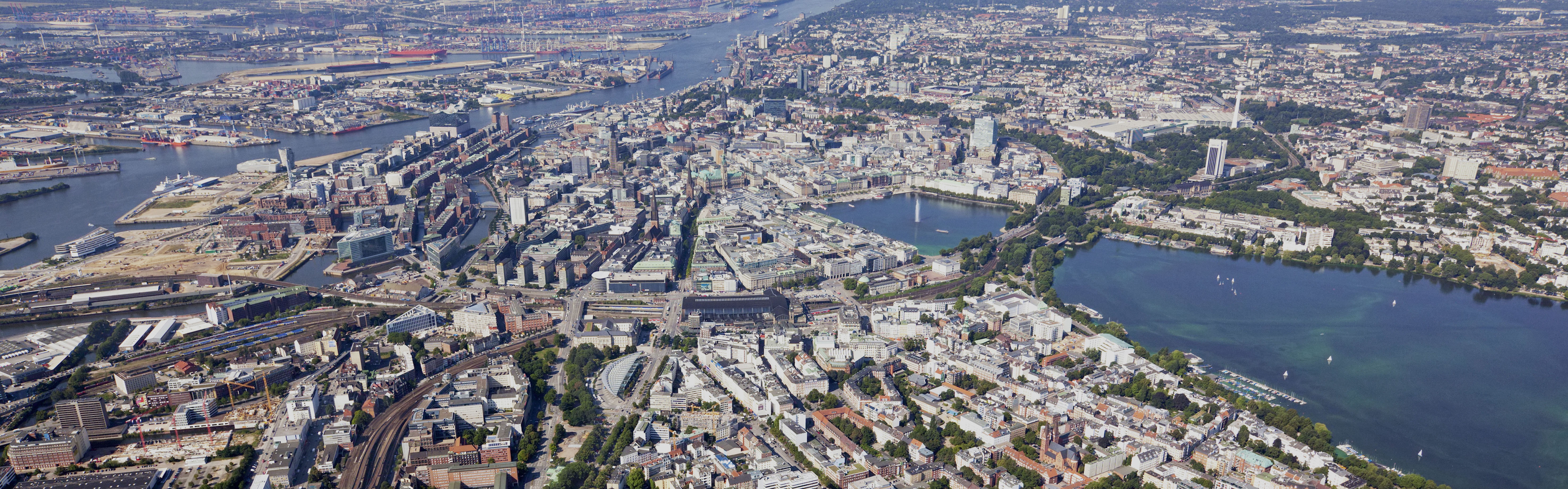 City of Hamburg with Alster lake and harbor on the Elbe river